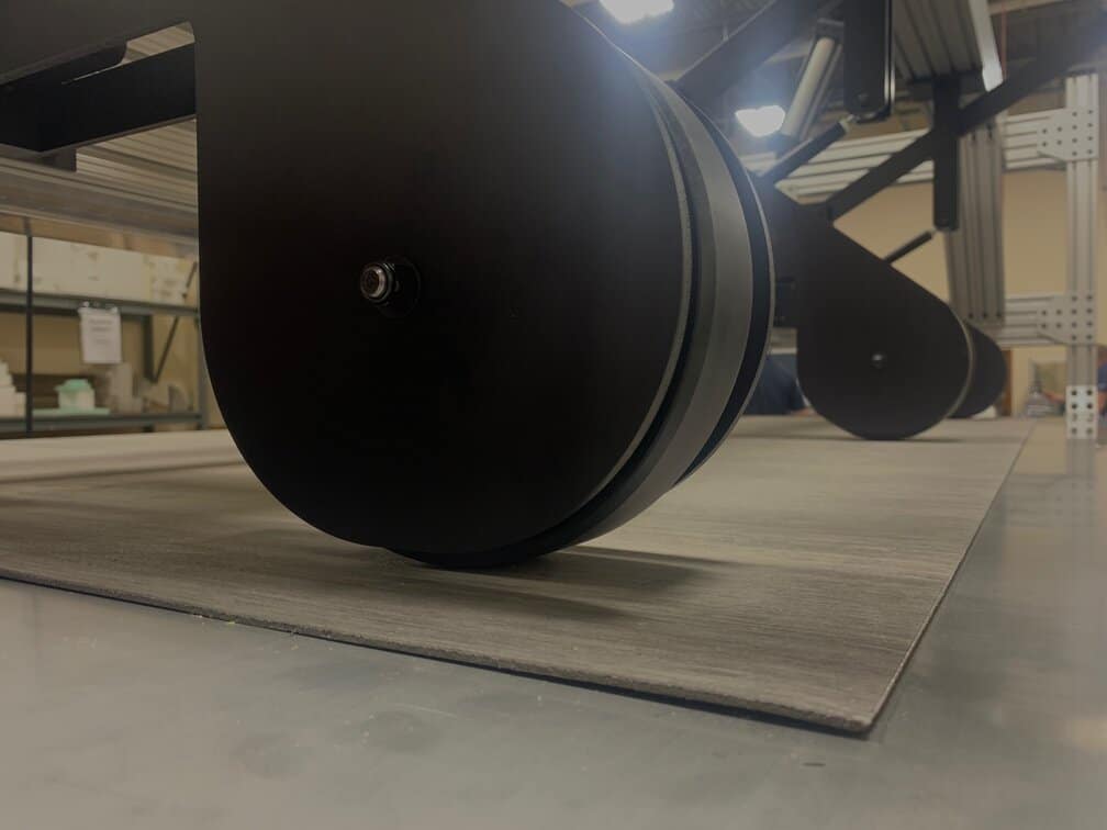 machine for measuring emboss depth and consistency